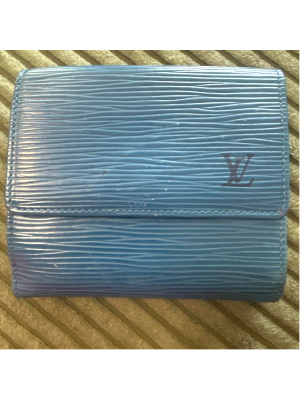 Preowned Blue Epi Louis Vuitton wallet with wavy texture